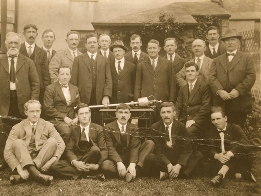 Wicklow Urban District Council circa 1922 with James Everett seated to the right of the mace and C.M. Byrne in the centre (with the hat) behind the mace